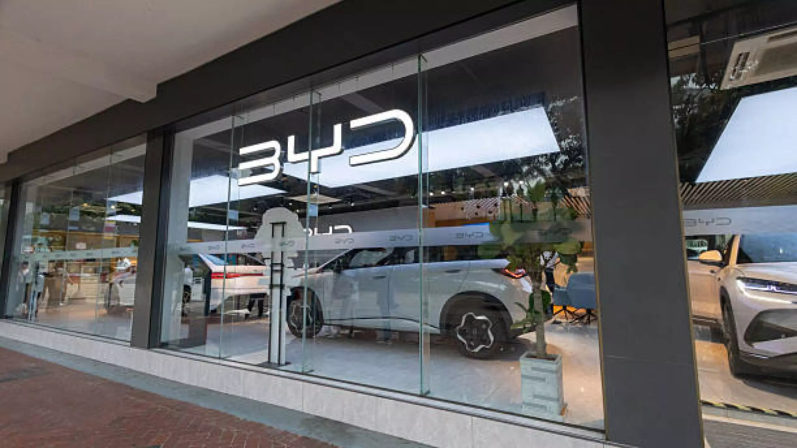 BYD showroom displaying electric vehicles, reflecting the brand’s global leadership in EV sales.